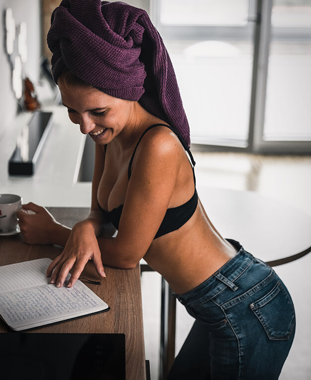 Breast lift woman reading