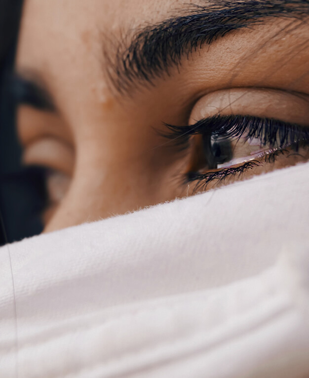 Eyelid surgery woman with scarf