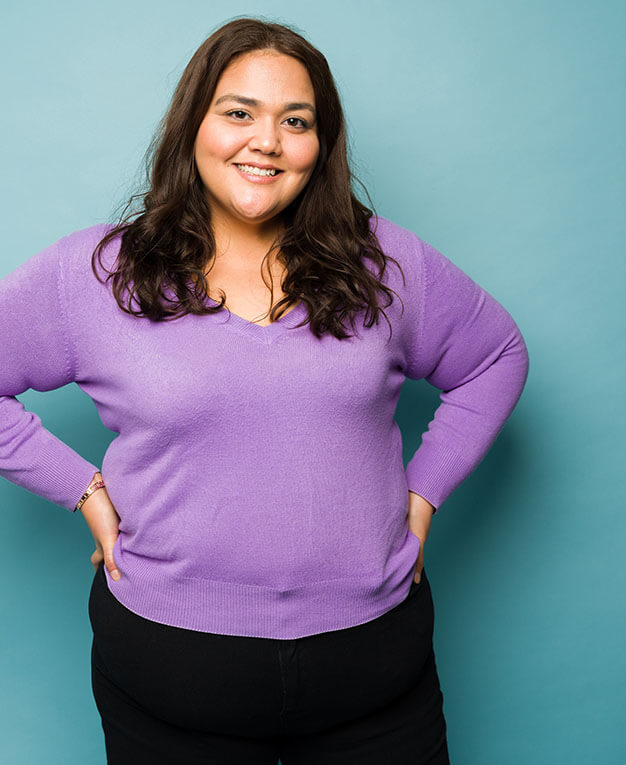 woman in purple sweater