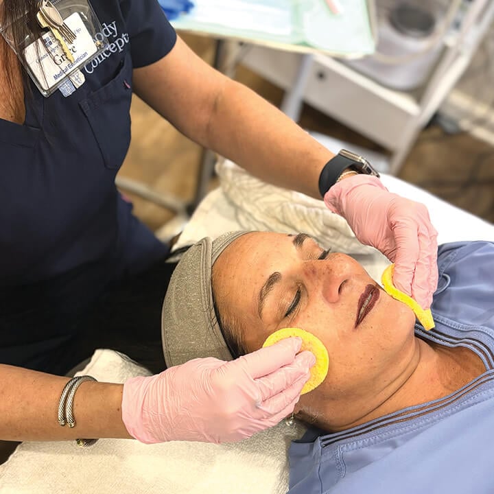 nubody concepts Memphis patient receiving facial treatment
