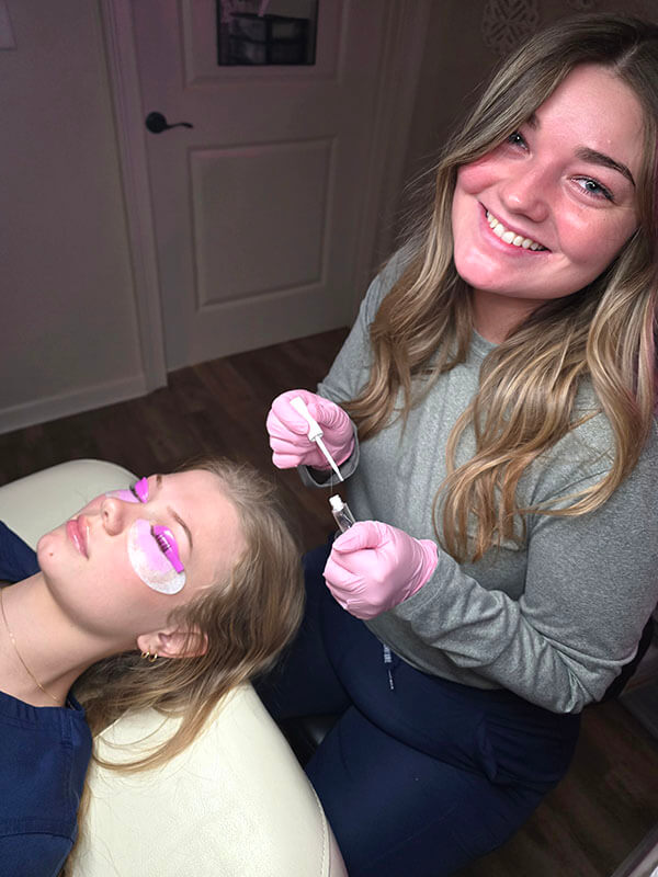 licensed aesthetician Caitlin performing a lash lift at nubody concepts cosmetic surgery & medspa Germantown